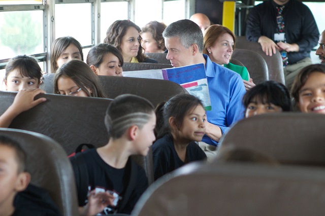 students sitting in a school bus